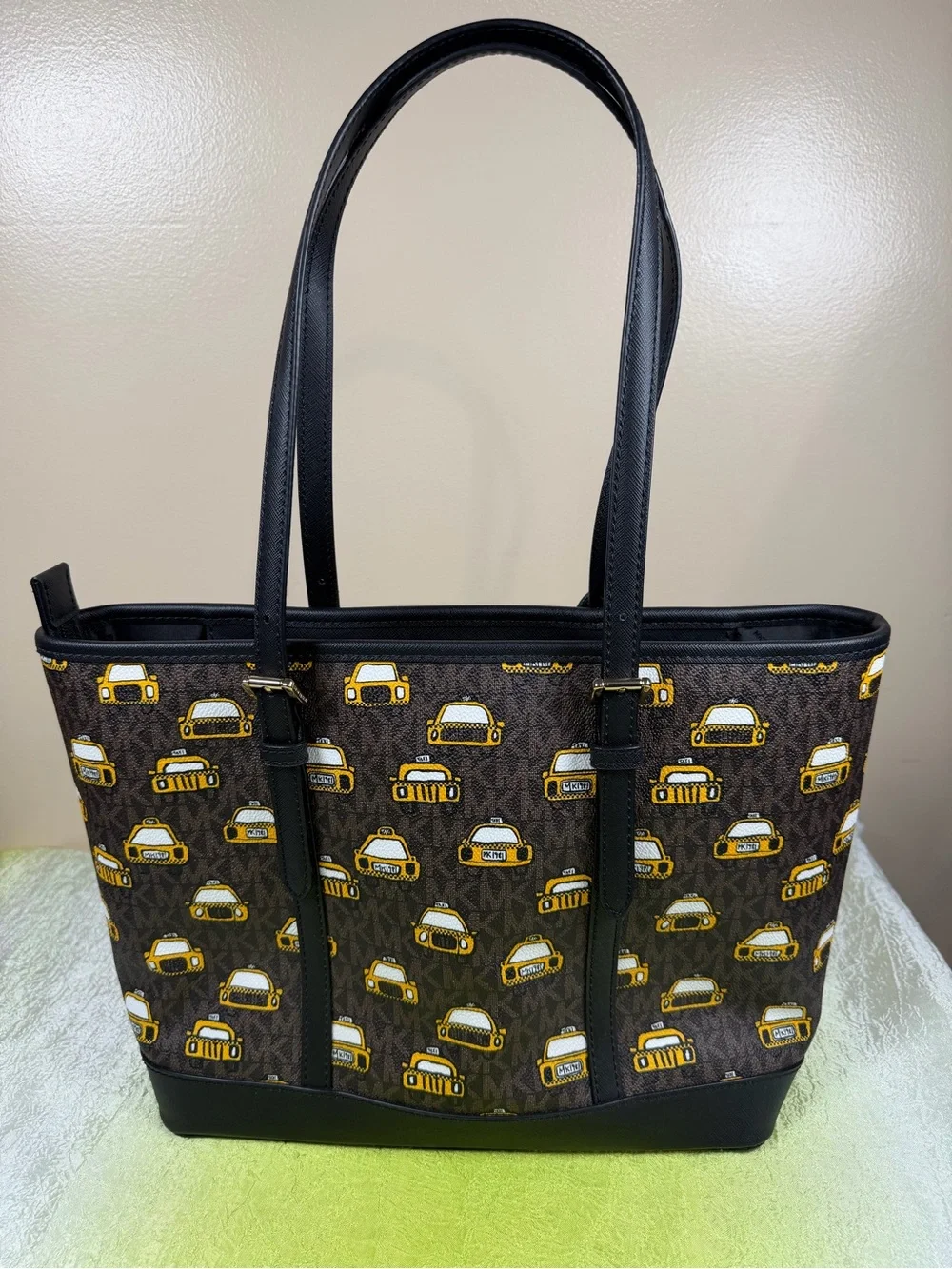 Michael Kors Brown Monogram Tote with Yellow Taxi Print and Black Trim